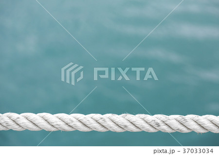strong sea rope on the blue sea strong sea rope on the blue sea 37033034
