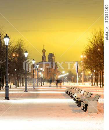Alley at winter night. 37035100
