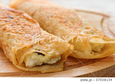 Pancakes stuffed with cottage cheese Pancakes stuffed with cottage cheese 37038134