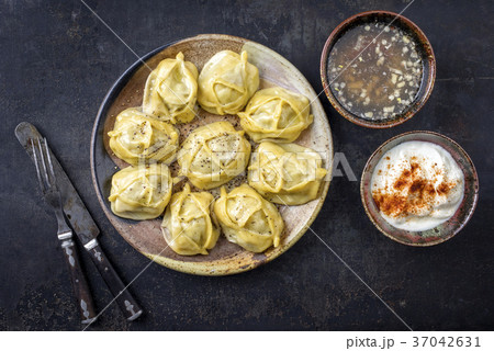 Traditional Turkish Manti with Joghurt and Vinegar 37042631