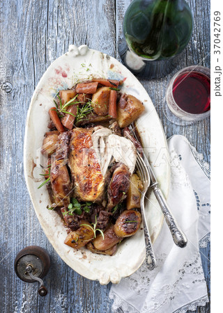 Coq au Vin with Vegetable in Burgundy Sauce Coq au Vin with Vegetable in Burgundy Sauce 37042769