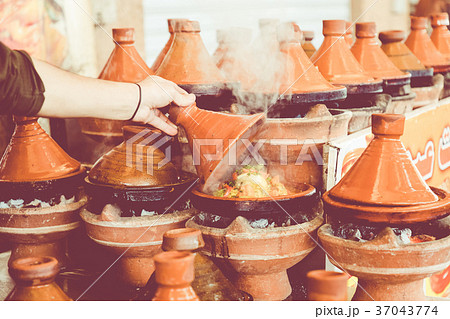 Cooking traditional Moroccan dish Cooking traditional Moroccan dish 37043774