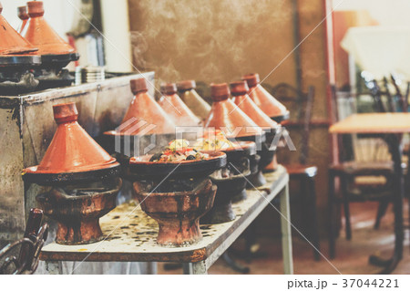 Cooking of meat in traditional Moroccan tajine 37044221