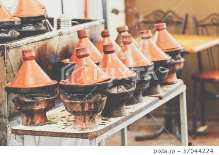 Cooking of meat in traditional Moroccan tajine 37044224