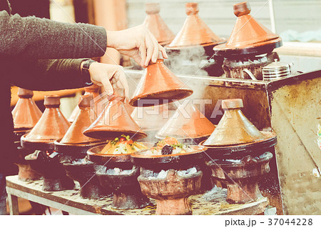 Cooking traditional Moroccan dish 37044228