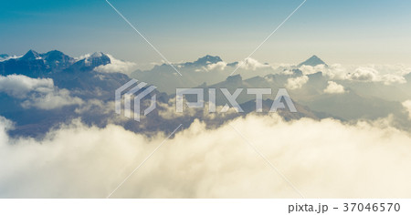 Silhouettes of the mountain in clouds Silhouettes of the mountain in clouds 37046570