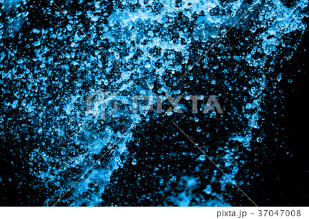 blue water splash on the black background. 37047008