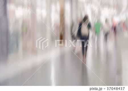 Abstract defocused motion blurred young people 37048437