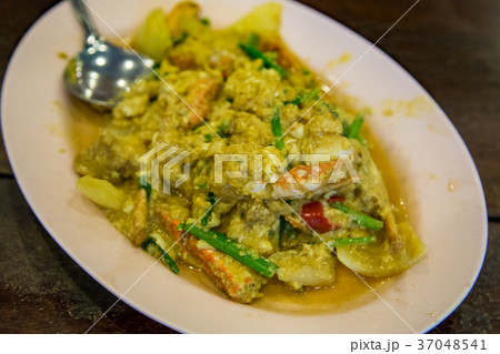 Delicious stir fried curry crab meat - close up. Delicious stir fried curry crab meat - close up. 37048541