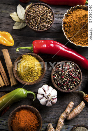 Spices and herbs and Wooden bowl Spices and herbs and Wooden bowl 37050240