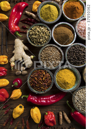 Spices and herbs and Wooden bowl Spices and herbs and Wooden bowl 37050362