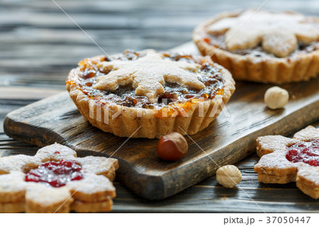 Cakes with dried fruits, orange jam and nuts. 37050447