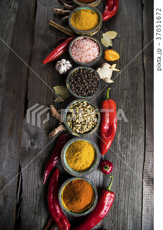 Spices and herbs and Wooden bowl 37051672