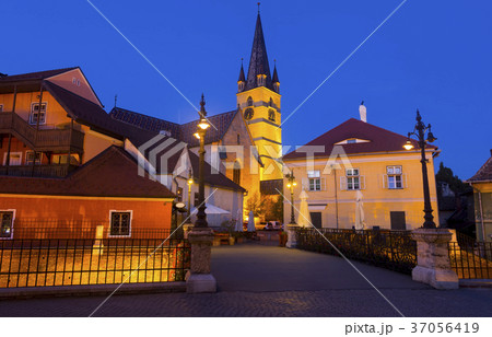 Sibiu streets with Cathedral in evening Sibiu streets with Cathedral in evening 37056419