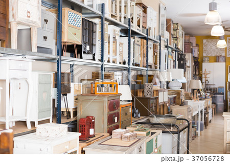 Modern furniture shop with wooden chest of drawers 37056728