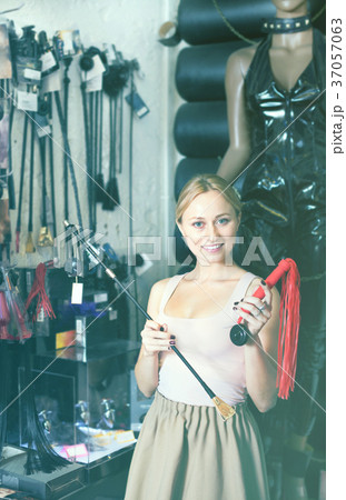 Female customer in adult products store 37057063