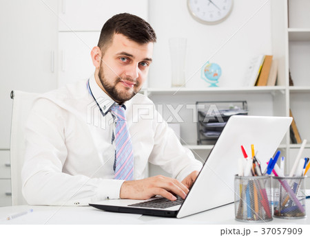 Man working productively Man working productively 37057909