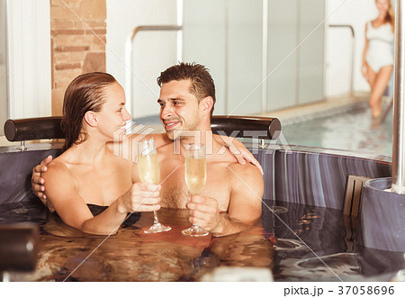 Man and woman are enjoying of celebration their date Man and woman are enjoying of celebration their date 37058696