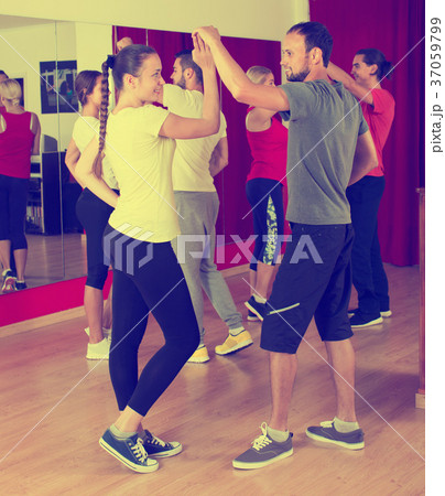 Adults dancing in dance studio 37059799