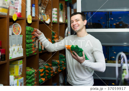 Man watching diet products 37059917