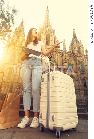 Charming traveling woman using paper map 37061336