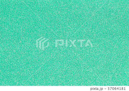 Closeup green gift wrapping paper textured Closeup green gift wrapping paper textured 37064181
