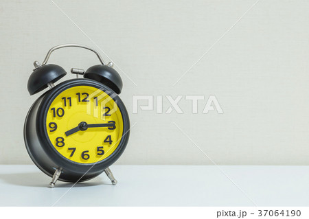 Closeup alarm clock show 8:15 a.m. Closeup alarm clock show 8:15 a.m. 37064190