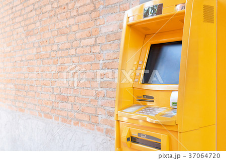 Automatic Teller Machine (ATM). Yellow cash  37064720