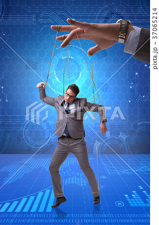 Businessman puppet being manipulated by boss Businessman puppet being manipulated by boss 37065214