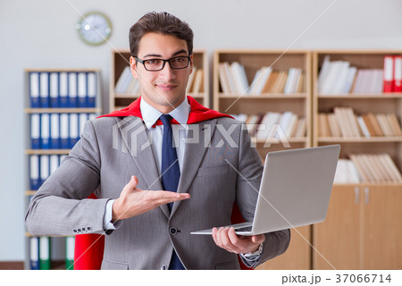Superhero businessman working in the office 37066714