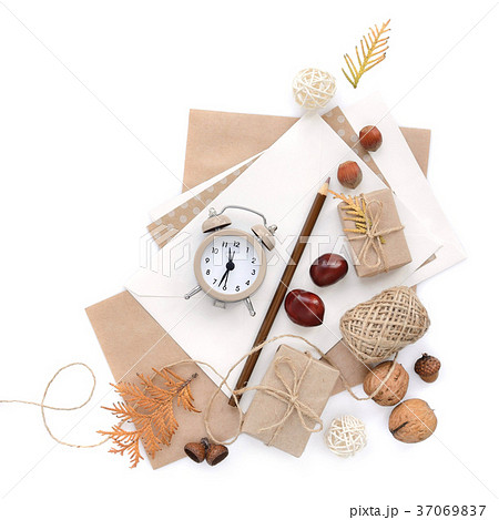 Autumn background with pencils and an alarm clock 37069837