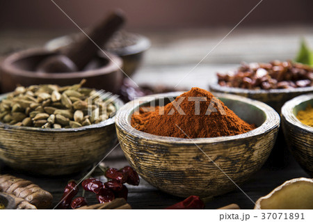 Spices and herbs and Wooden bowl 37071891