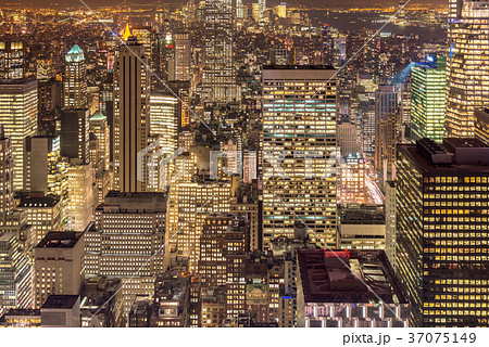 Night view of New York Manhattan during sunset Night view of New York Manhattan during sunset 37075149