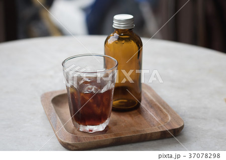 Coffee cold brew in brown bottle 37078298