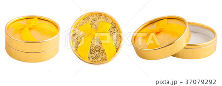 Golden gift box with bow isolated 37079292