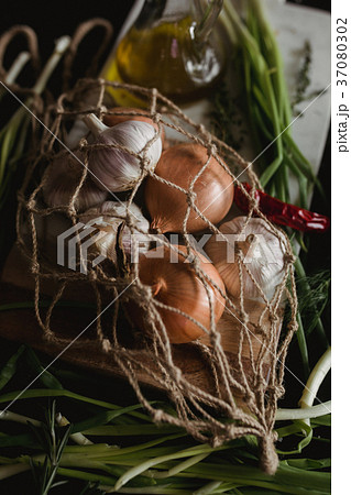 Raw Garlic, onion, dill and parsley for soup for Raw Garlic, onion, dill and parsley for soup for 37080302