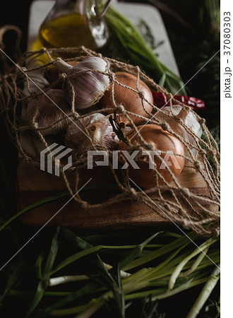 Raw Garlic, onion, dill and parsley for soup for 37080303