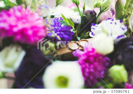 Two golden wedding rings isolated background 37080761