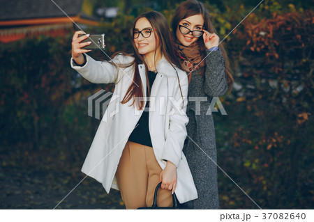 Two beautiful sisters 37082640