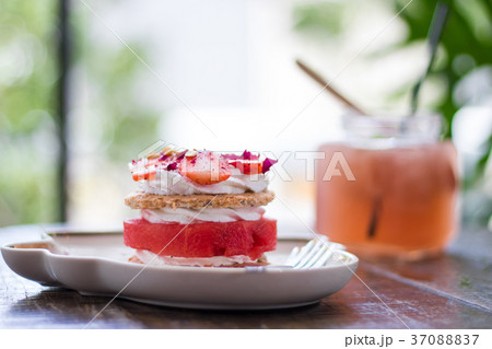 Watermelon cake with strawberry sliced on top Watermelon cake with strawberry sliced on top 37088837