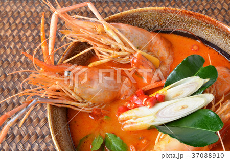 Tom Yum Kung and condiments (Thai cuisine). Tom Yum Kung and condiments (Thai cuisine). 37088910