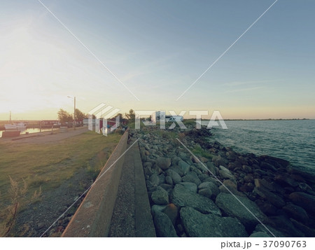 Motorboat for fishing tied to wooden floating pier Motorboat for fishing tied to wooden floating pier 37090763