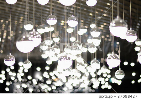 Concept lighting , Light bulb in a dark place. Concept lighting , Light bulb in a dark place. 37098427