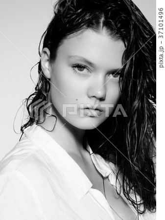 Portrait of beautiful young girl with long wet hair Portrait of beautiful young girl with long wet hair 37101496