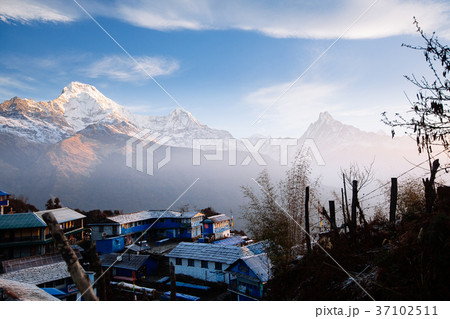 Sunrise in Annapurna area mountains in the Himalay 37102511