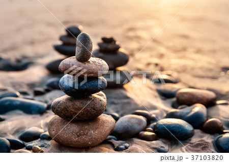 Pile of Balanced Rocks at the Beach, California 37103820