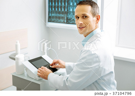 Smart positive doctor being at work 37104796