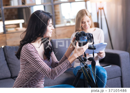 Pleasant nice woman looking at the camera 37105486