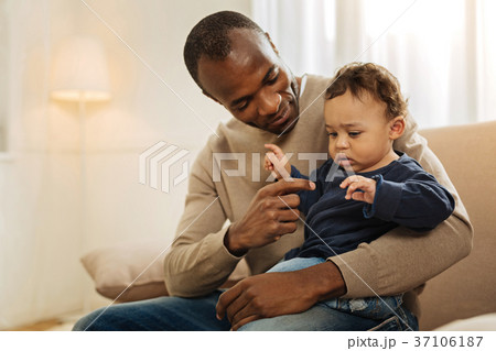 Alert man playing with his child Alert man playing with his child 37106187