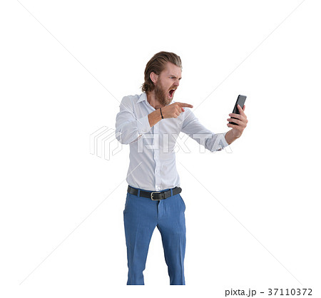 Angry western businessman blaming a customer on the phone isolat Angry western businessman blaming a customer on the phone isolat 37110372
